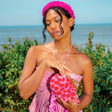 ARNOLDI Daisy Hand-Beaded Clutch, in Pink & Red