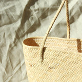 Borneo Serena Straw Tote Bag With Green Pom-Poms - ourCommonplace